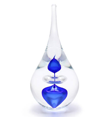 Handmade Glass Paperweight in drop shape with inside decor.